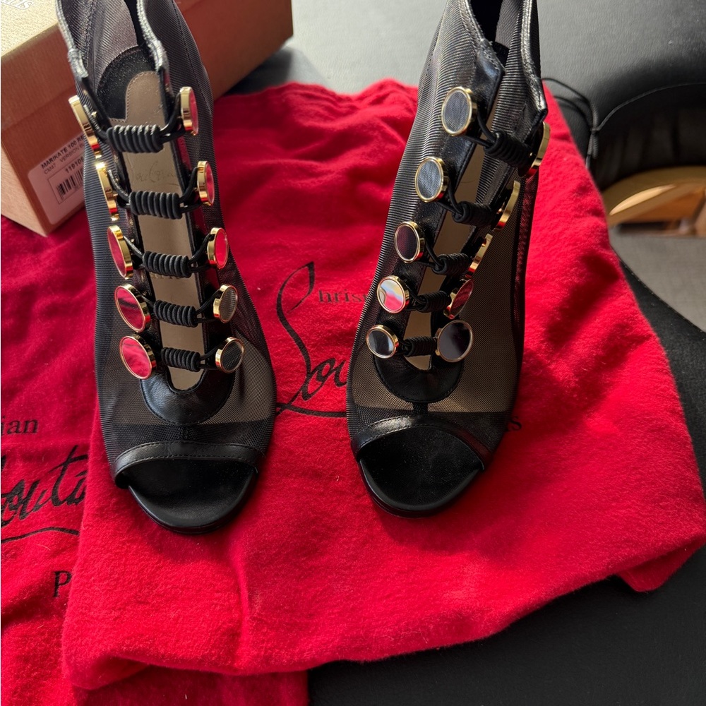 Christian Louboutin Black and Gold Heels authentic